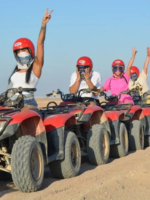 A happy family enjoying the ATV Quad in Super Safari Hurghada trip