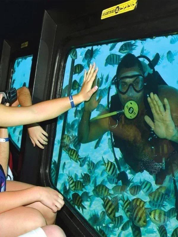 Tourists watching coral reefs on Royal Sea Scope Hurghada