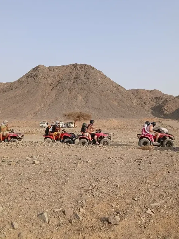 Tourists enjoying an ATV Quad trip in the Marsa Alam desert